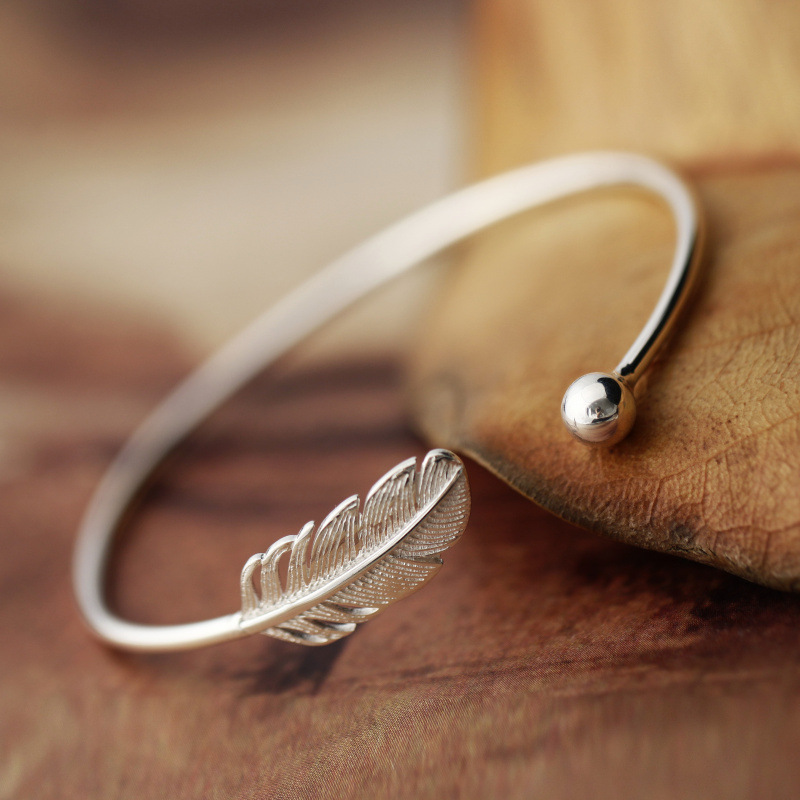 Brazalety z piór srebrne - Pulsera z piór