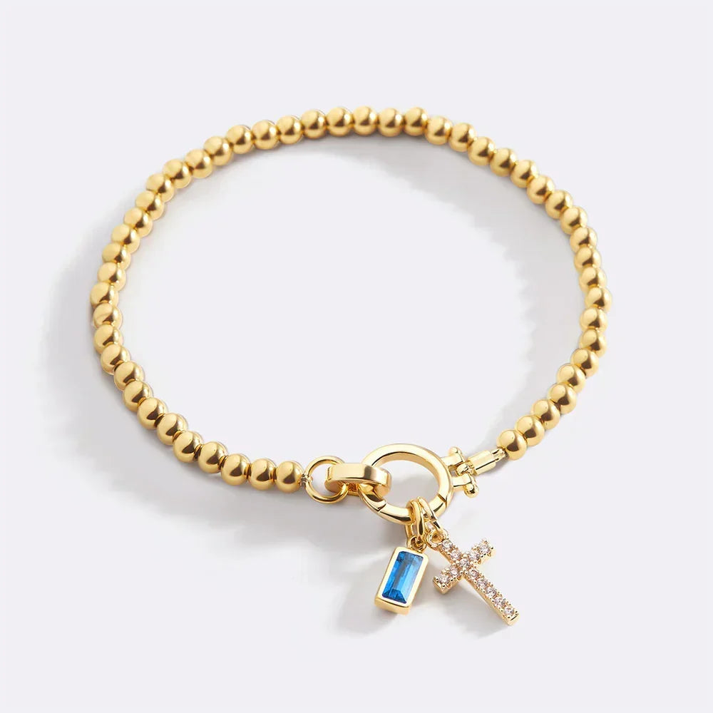Eli – Pulsera z wisiorkiem w kształcie krzyża