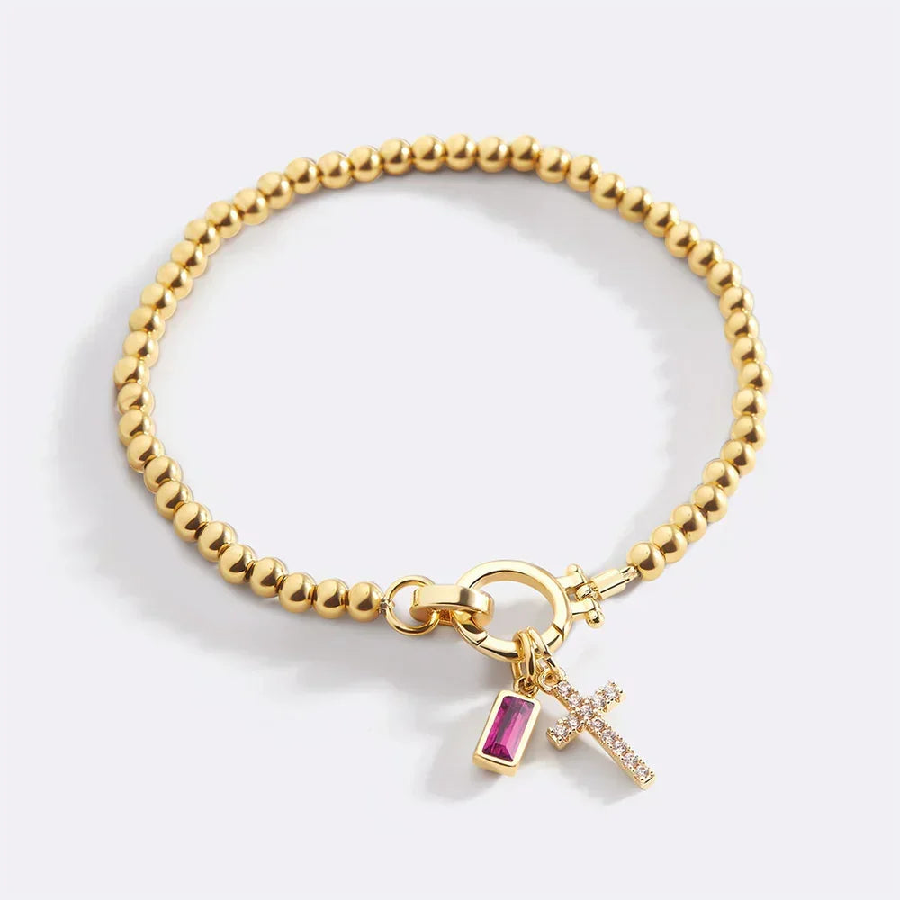 Eli – Pulsera z wisiorkiem w kształcie krzyża