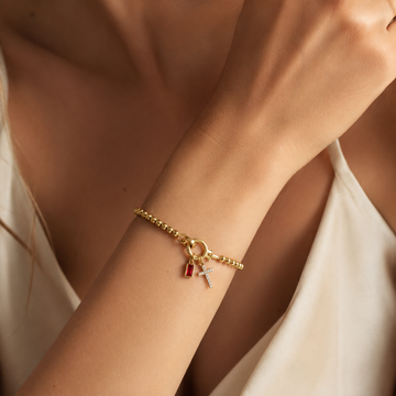 Eli – Pulsera z wisiorkiem w kształcie krzyża