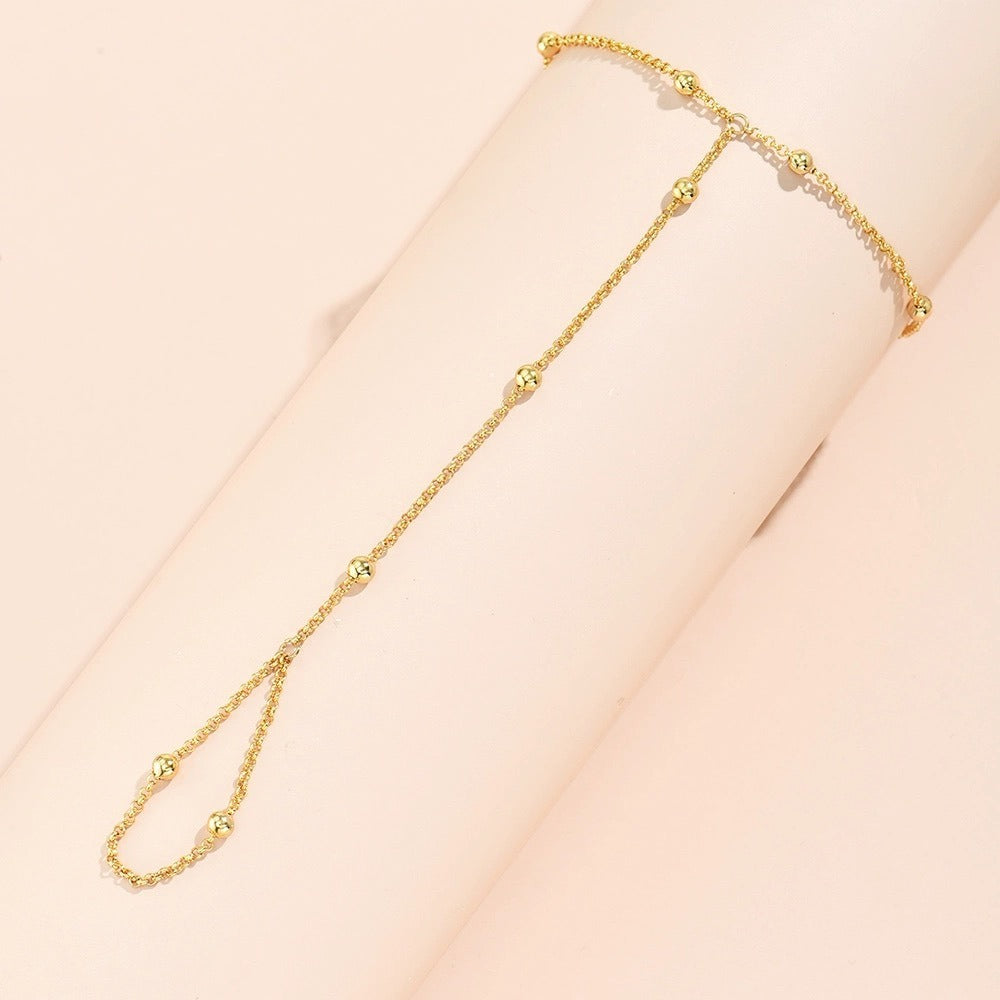 Lisa – Pulsera łańcuch perłowy i rękawiczki